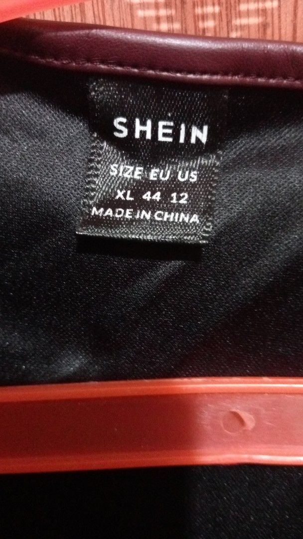 Shein Faux Leather Jacket XL (Category: Coats, Jackets and Outerwear) located in Manila. Submitted by foreva030930091 (Listing ID 1419326130, Image 2). Description: Used once for Year End Party 2025 - Shein faux leather jacket - Burgundy color - Cropped design - Black lining - Size XL - Made in China.