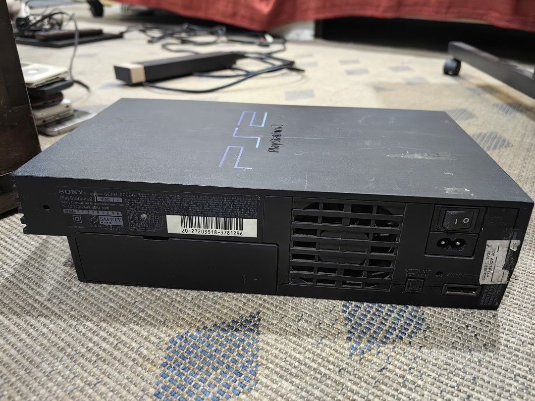 Sony PlayStation 2 Console (Category: PlayStation) located in Quezon City. Submitted by flat.earther23 (Listing ID 1419199516, Image 2). Description: - Sony PlayStation 2 console - Features the PlayStation 2 logo - Color: Black - Includes memory card and USB ports - Back ports and power switch included included -deffective loading tray.