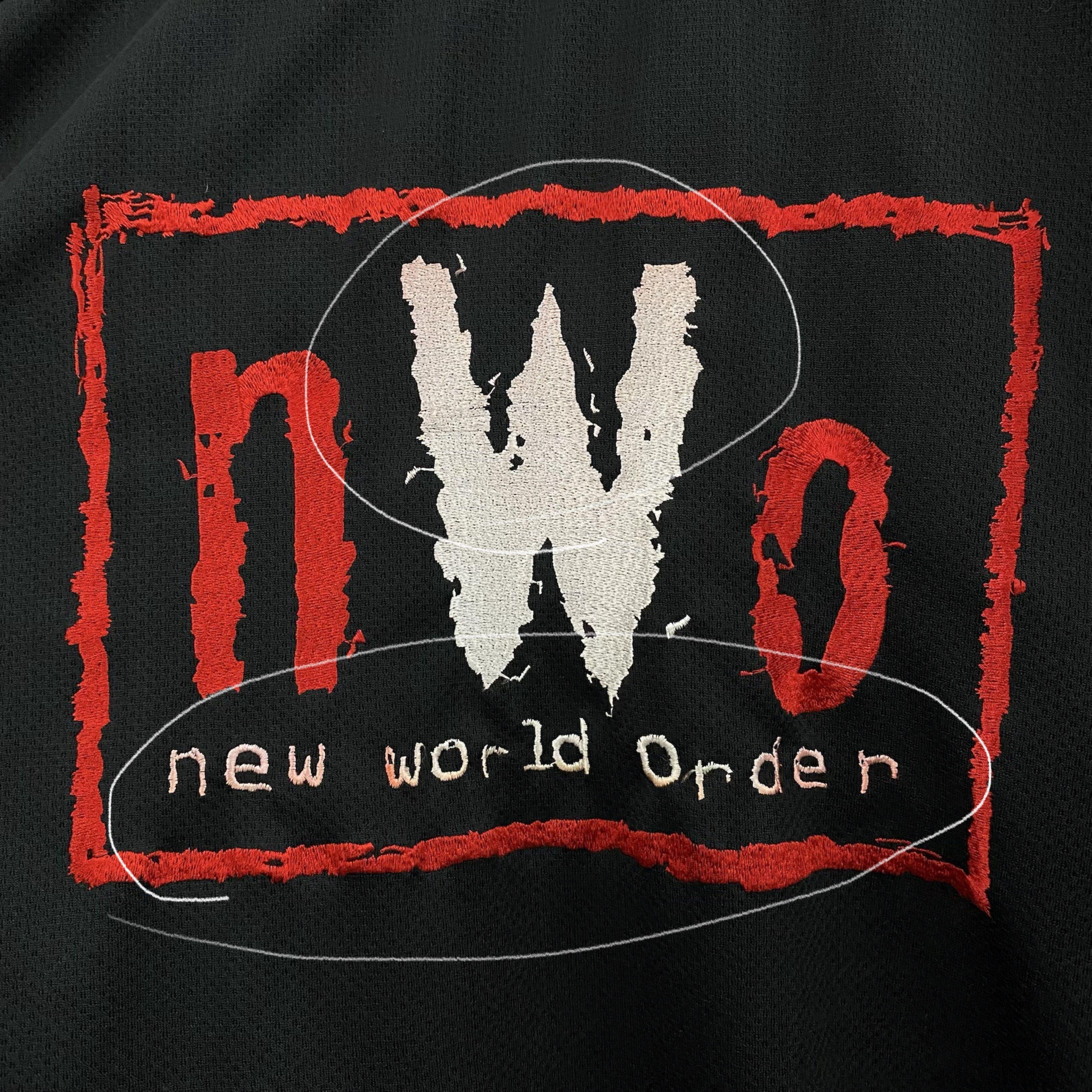 Starter NWO Hockey Jersey (Category: Activewear) located in Cavite. Submitted by mana__ (Listing ID 1419378654, Image 3). Description: - Vintage Starter hockey jersey - Features NWO (New World Order) logo - Number 9 on the back - Color: Black with red and white accents - Size: Large - V-neck collar with Starter branding - Issue : bleed - Dimension Large Width - 28.5 Length - 30 .