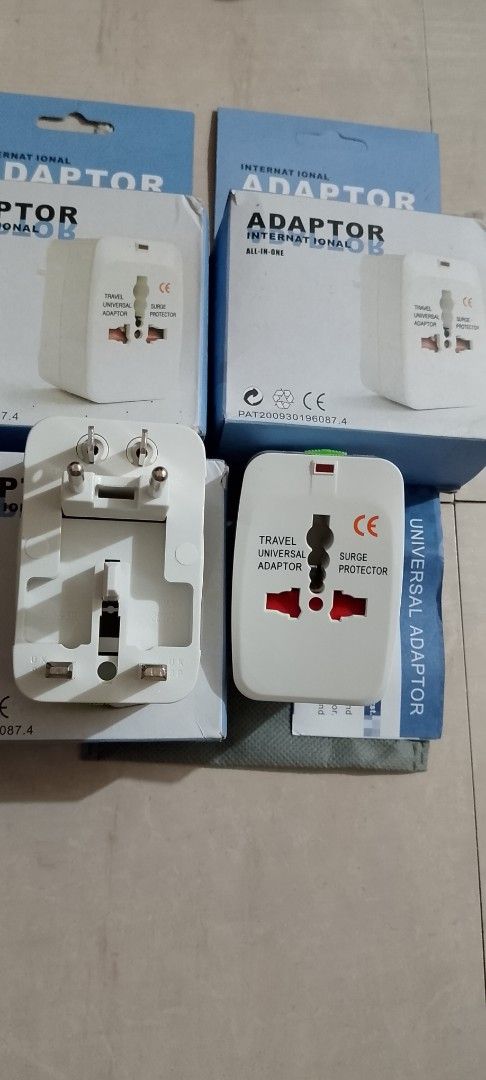 Universal Travel Adaptor (Category: Cables & Adaptors) located in Quezon City. Submitted by hajjasittienor (Listing ID 1419364132, Image 1). Description: - Universal travel adapter - For international use - Surge protector included - Multiple plug configurations - Comes with original packaging - Compact and easy to carry - Ideal for travelers.