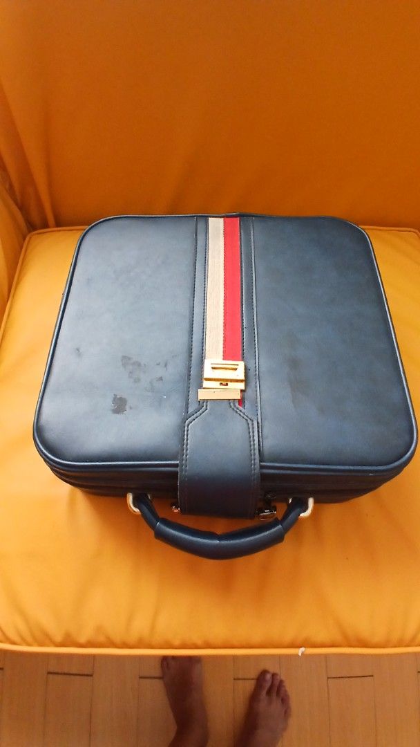 Vintage Poker Chip Set with Case (Category: Board Games & Puzzles) located in San Juan City. Submitted by frugalmomph (Listing ID 1419239242, Image 1). Description: - Vintage poker chip set - Includes a black case with handle - Case made of leather-like material - Contains a large assortment of colorful poker chips.