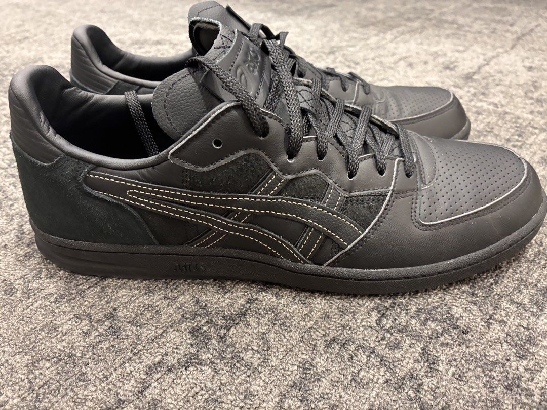 Asics GEL-NYC Black Sneakers - Repurposed Car Leather (Category: Sneakers) located in Singapore. Submitted by vik2222 (Listing ID 1422413869, Image 1). Description: - Asics GEL-NYC sneakers in black - Made with repurposed car leather - Sleek design with contrasting stitching - Minimal wear and tear - Clean soles - Perfect for everyday wear.
