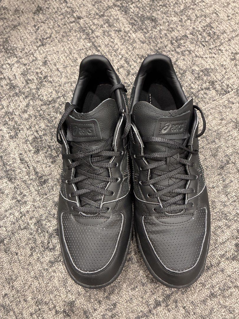 Asics GEL-NYC Black Sneakers - Repurposed Car Leather (Category: Sneakers) located in Singapore. Submitted by vik2222 (Listing ID 1422413869, Image 2). Description: - Asics GEL-NYC sneakers in black - Made with repurposed car leather - Sleek design with contrasting stitching - Minimal wear and tear - Clean soles - Perfect for everyday wear.