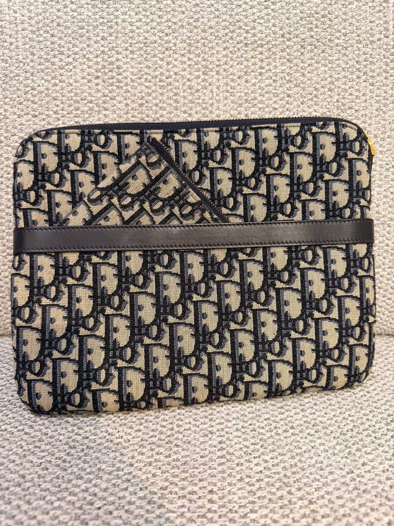 authentic Dior Pouch and coin purse (Category: Luxury Bags & Wallets) located in Quezon City. Submitted by jhaediah (Listing ID 1389809908, Image 1). Description: Pouch and coin purse 💓2-20 Both in excellent condition LBc or JRs courier.