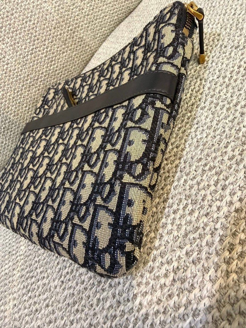 authentic Dior Pouch and coin purse (Category: Luxury Bags & Wallets) located in Quezon City. Submitted by jhaediah (Listing ID 1389809908, Image 3). Description: Pouch and coin purse 💓2-20 Both in excellent condition LBc or JRs courier.
