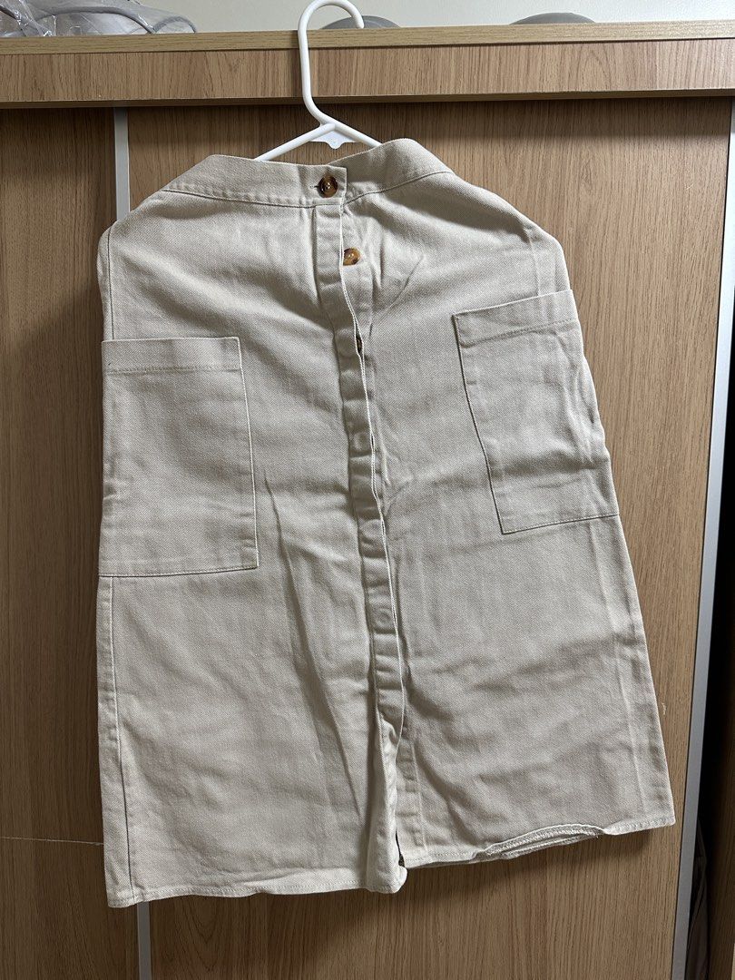 Beige Button-Down Skirt (Category: Skirts) located in Santa Rosa. Submitted by krxtnm (Listing ID 1422407602, Image 1). Description: - Beige skirt - Button-down front - Two front pockets - Collared neckline.