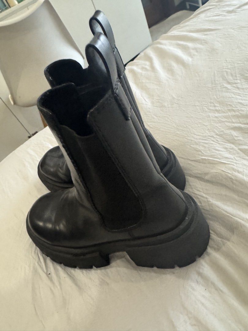 Black Chelsea Boots Size 37 (Category: Boots) located in Manila. Submitted by aadr1127 (Listing ID 1422417100, Image 3). Description: - Black Chelsea boots - Chunky sole - Size 37 - Pull tab at the back - Elastic side panels - Round toe - Made of leather or leather-like material.