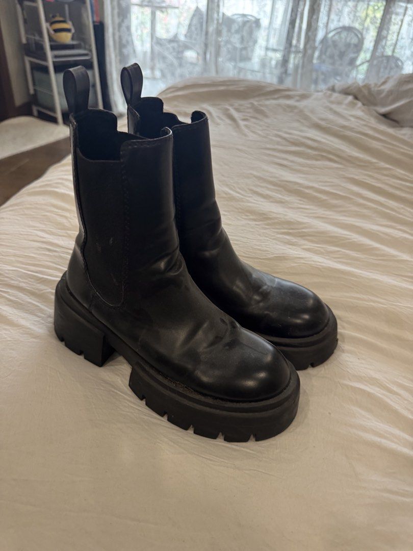 Black Chelsea Boots Size 37 (Category: Boots) located in Manila. Submitted by aadr1127 (Listing ID 1422417100, Image 1). Description: - Black Chelsea boots - Chunky sole - Size 37 - Pull tab at the back - Elastic side panels - Round toe - Made of leather or leather-like material.