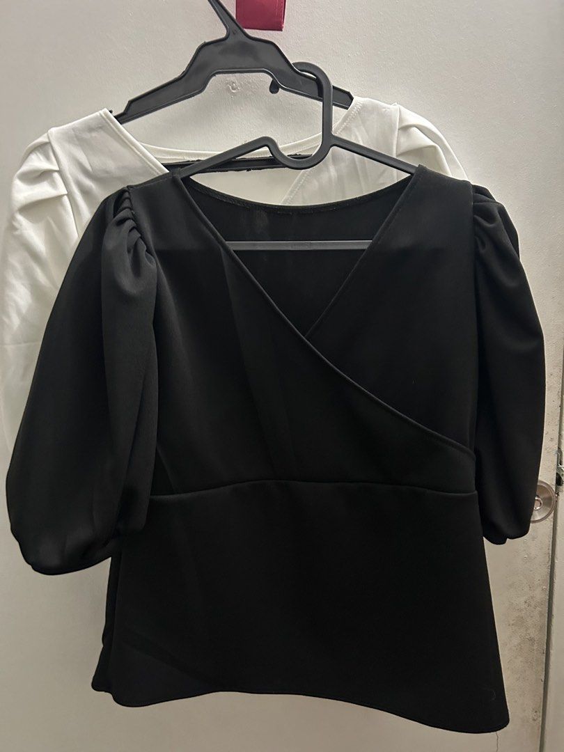 Black Wrap Blouse with Puff Sleeves (Category: Blouses) located in Marikina City. Submitted by fm.ty (Listing ID 1422472171, Image 1). Description: Black wrap blouse with V-neck and puff sleeves. Tailored fit, slightly flared hem. Ready to wear. small to medium.