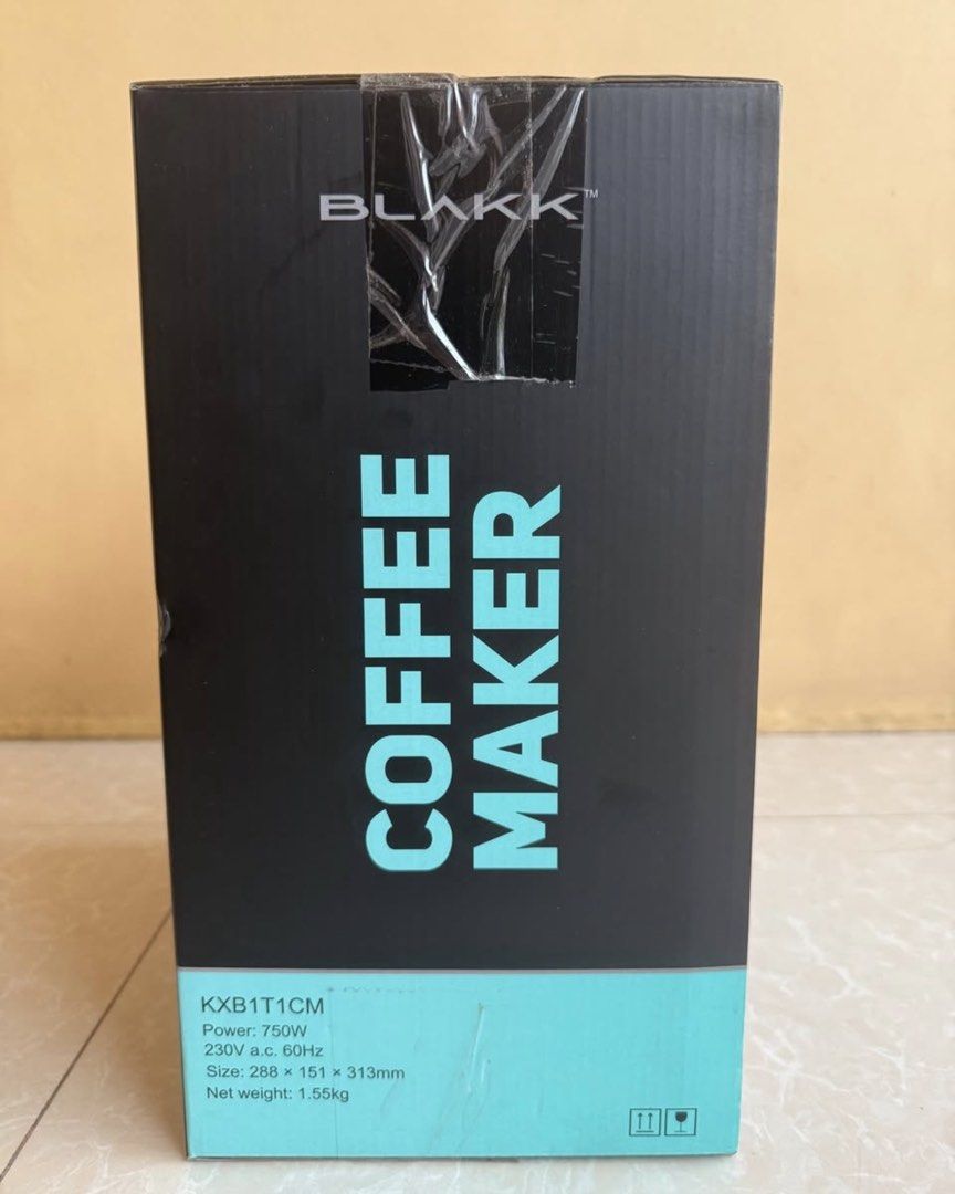 Blakk Coffee Maker (Category: Coffee Machines & Makers) located in Ibaan. Submitted by victoridee (Listing ID 1422534671, Image 2). Description: Blakk coffee maker with a capacity of 1.25L/10 cups. Features a 30-second anti-drip function, switch control, auto keep warm function, and boil-dry protection. It is dishwasher safe and includes a glass carafe and funnel with a permanent nylon filter. Power is 750W, 230V a.c. 60Hz. Size is 288 x 151 x 31