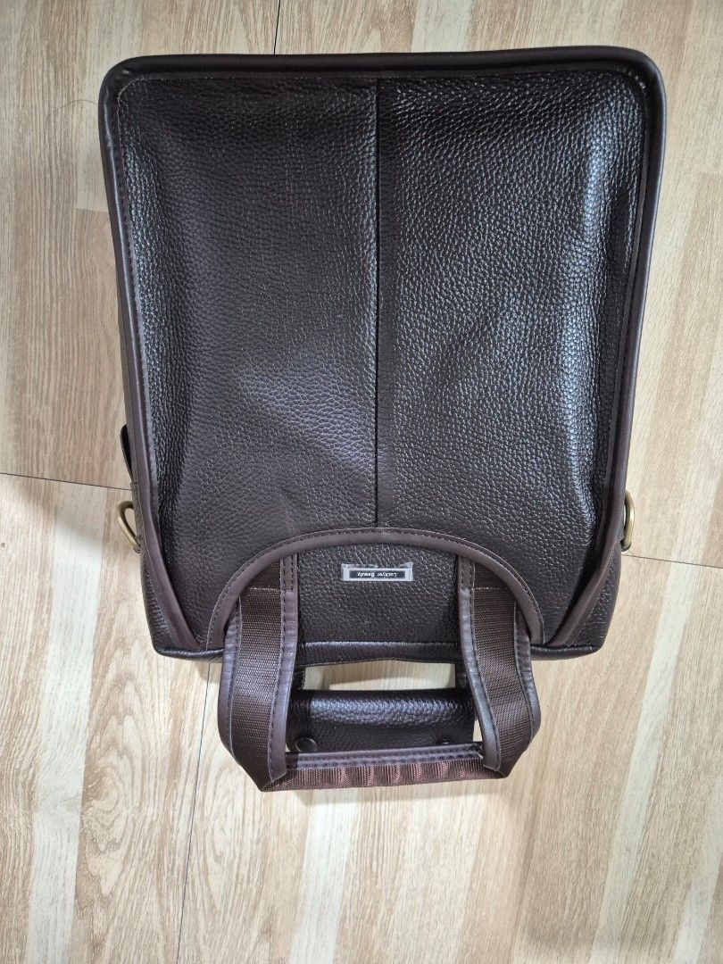 Brown Leather Laptop Bag (Category: Laptop Bags & Sleeves) located in Manila. Submitted by bajoyskie (Listing ID 1422434611, Image 2). Description: - Brown textured leather laptop bag - Top handle and detachable shoulder strap - Zippered main compartment - Interior pocket - Gold-toned hardware - Suitable for laptops and essentials.