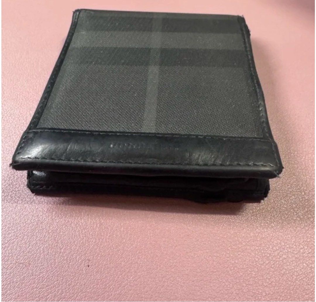 Burberry Checkered Wallet - Made in Italy (Category: Luxury Bags & Wallets) located in Tagbilaran City. Submitted by chawbello (Listing ID 1422528268, Image 3). Description: - Authentic Burberry wallet - Classic checkered pattern - Bi-fold design - Multiple card slots - Cash compartments - Black leather trim .