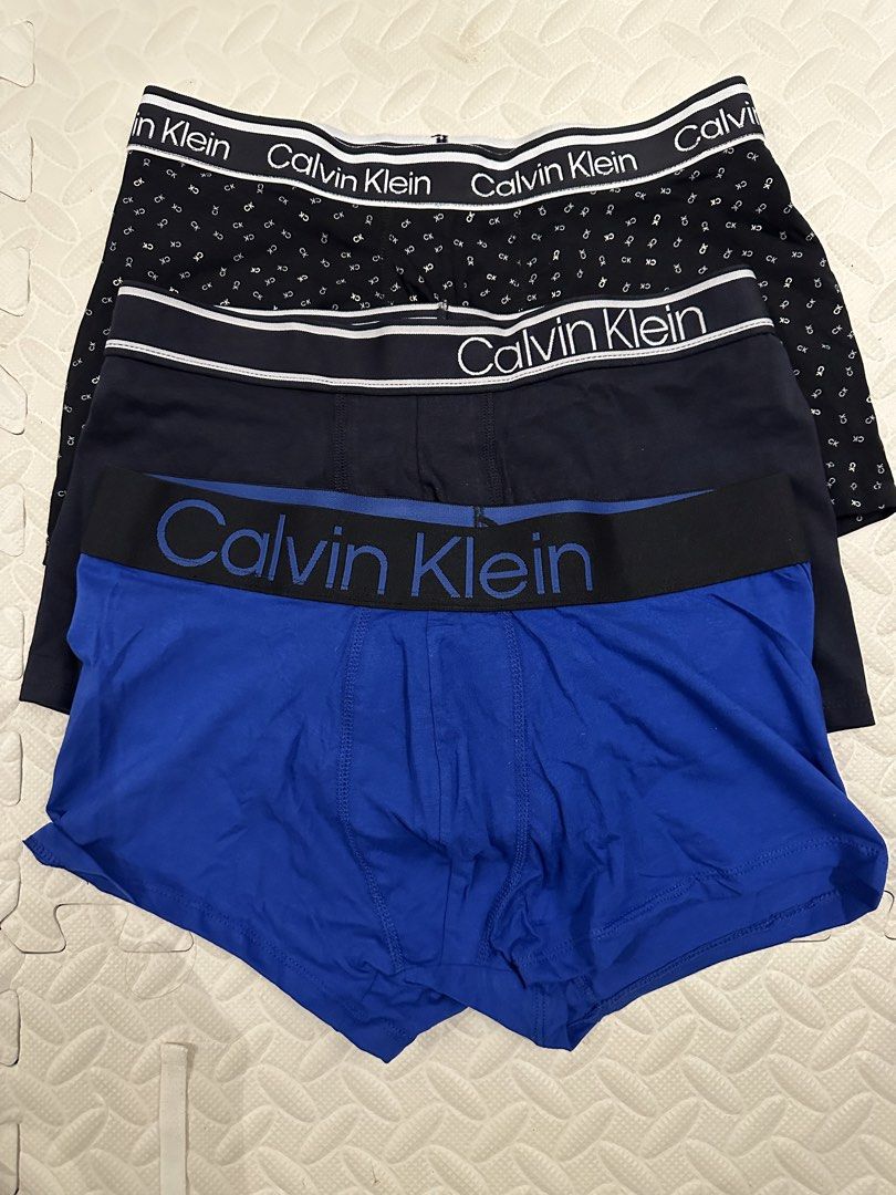 Calvin Klein Cotton Stretch 3-Pack Trunks (Category: Underwear) located in Paranaque City. Submitted by missmargerrieal (Listing ID 1422533814, Image 3). Description: Calvin Klein Cotton Stretch 3-pack trunks. Available in various colors, including blue, black, red, and gray. Made of cotton stretch material. Each pack contains three boxer briefs. Sizes: S, M, L, XL Selling 550 per box ( 3pcs Boxer Briefs ) .