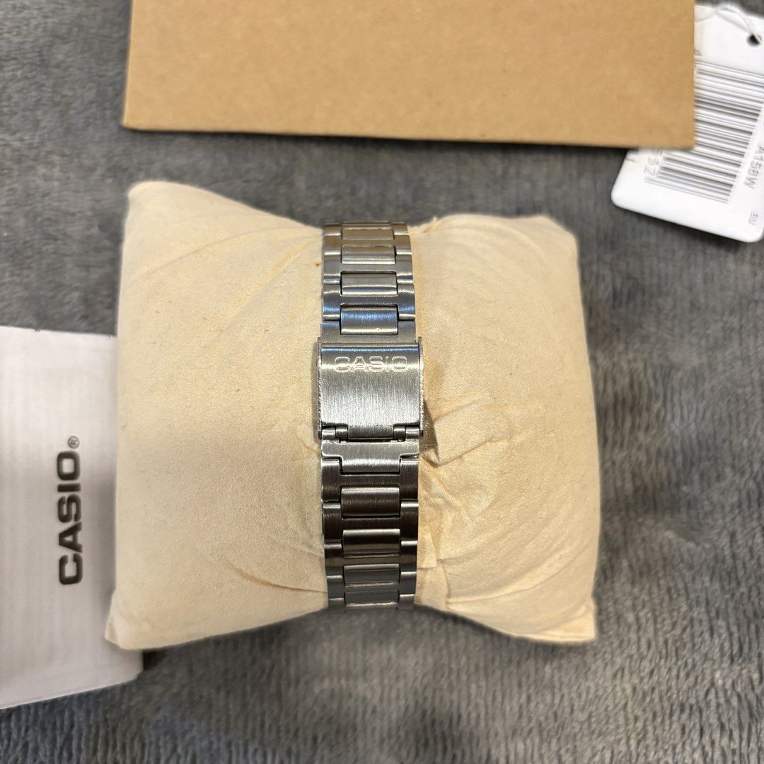 Casio A158 Silver (Category: Men's Watches) located in Pasay City. Submitted by lychee_ph (Listing ID 1422439050, Image 3). Description: - Casio A158W digital watch - Stainless steel band - Features: Alarm, Chronograph, Water Resistant - Displays: Time, Day, Date - Includes original packaging .