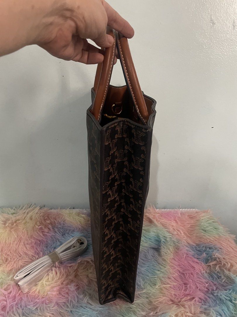 Celine Tote Bag with Shoulder Strap (Category: Luxury Bags & Wallets) located in Pasig City. Submitted by ladyboss1012 (Listing ID 1422483005, Image 2). Description: - Celine tote bag - Brown leather handles - Detachable shoulder strap - Celine logo detail - Repeating pattern exterior - Interior zippered pocket.