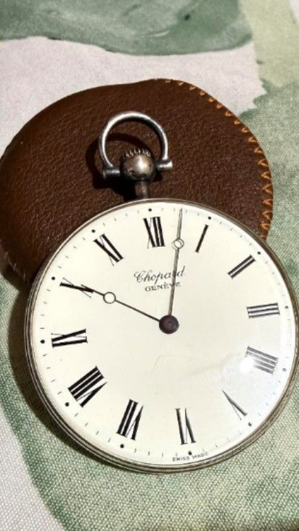 Chopard Geneve Pocket Watch (Category: Luxury Watches) located in Caloocan City. Submitted by pdflexgekotenphil (Listing ID 1422397477, Image 3). Description: - Chopard Geneve pocket watch - White dial with black Roman numeral hour markers - Black hands - Silver .800 with hallmark - Loop for chain attachment - Includes leather pouch - Includes protective case - Chinese characters on the back Open for Trade.