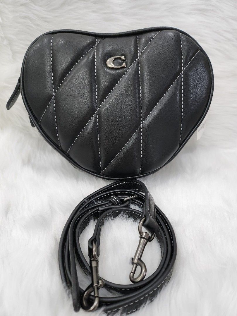 Coach Black Handbag (Category: Luxury Bags & Wallets) located in Manila. Submitted by bajoyskie (Listing ID 1422513975, Image 1). Description: - Black leather Coach handbag - Zipper closure - Brown interior lining - Interior pocket - White stitching detail.