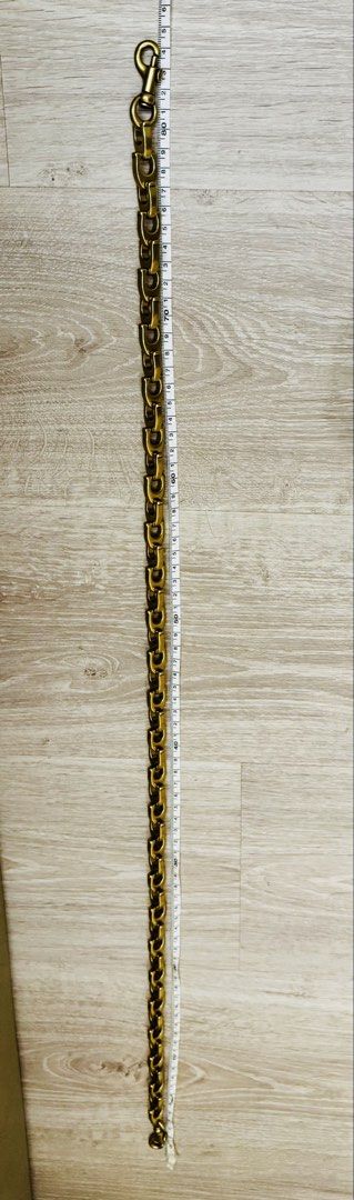 Coach “c” chain strap good for vintage or new release (Category: Accessory Holder, Box & Organizers) located in Manila. Submitted by saleph (Listing ID 1422402392, Image 2). Description: Firm on price. Ultra rare item. Approx 84cm length. Metal brass feel. Vintage gold finish pairs well with vintage coach bags or other luxury bags. .