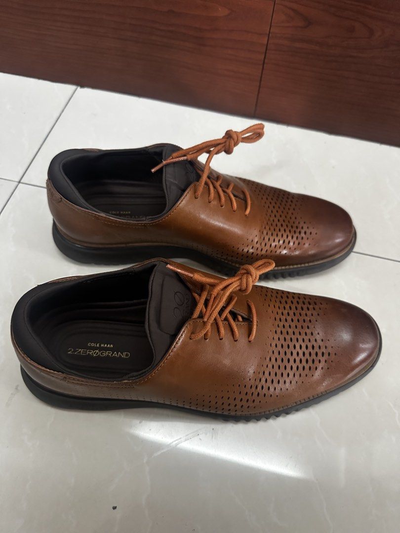 Cole Haan 2.zerogrand Men's Shoes (Category: Casual Shoes) located in Quezon City. Submitted by kishanity (Listing ID 1422393408, Image 3). Description: - Cole Haan 2.ZEROGRAND men's shoes - Brown color - Size 10.5M - Perforated design - Lace-up closure - Dark brown soles - Features Cole Haan logo .