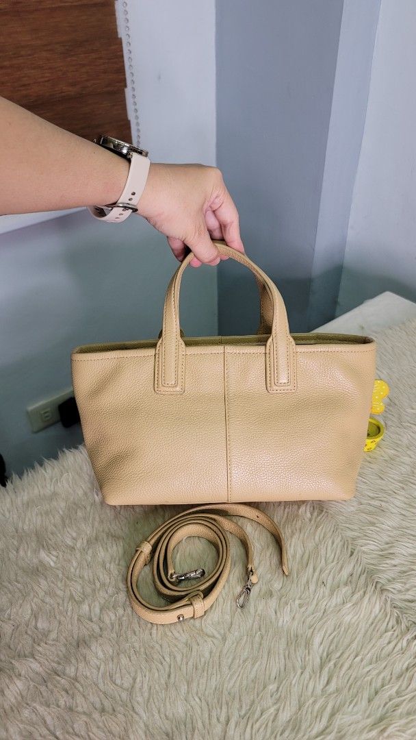 Couronne (Category: Luxury Bags & Wallets) located in Cavite. Submitted by amairos (Listing ID 1422543228, Image 3). Description: - Beige leather handbag - Top handle and detachable shoulder strap - Rectangular shape Zipper closure no flaw small to semi med..