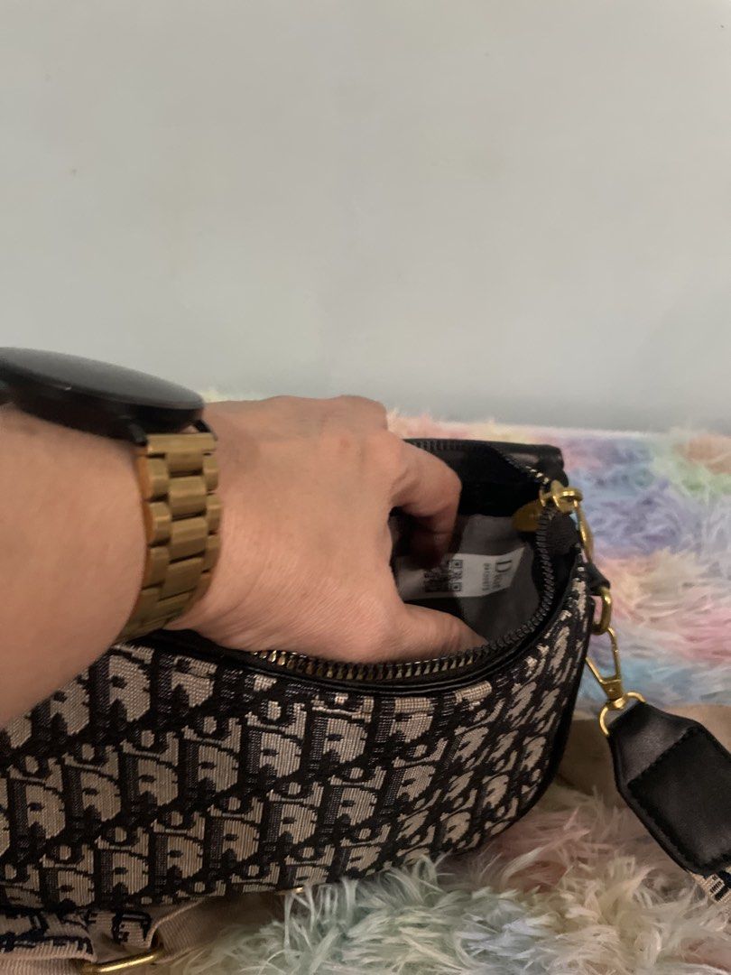 Dior Saddle Bag with Strap (Category: Luxury Bags & Wallets) located in Pasig City. Submitted by ladyboss1012 (Listing ID 1422484783, Image 3). Description: - Dior Saddle Bag - Iconic Dior Oblique pattern - Detachable strap for shoulder or crossbody wear - Flap closure with gold-tone CD buckle - Single interior compartment.
