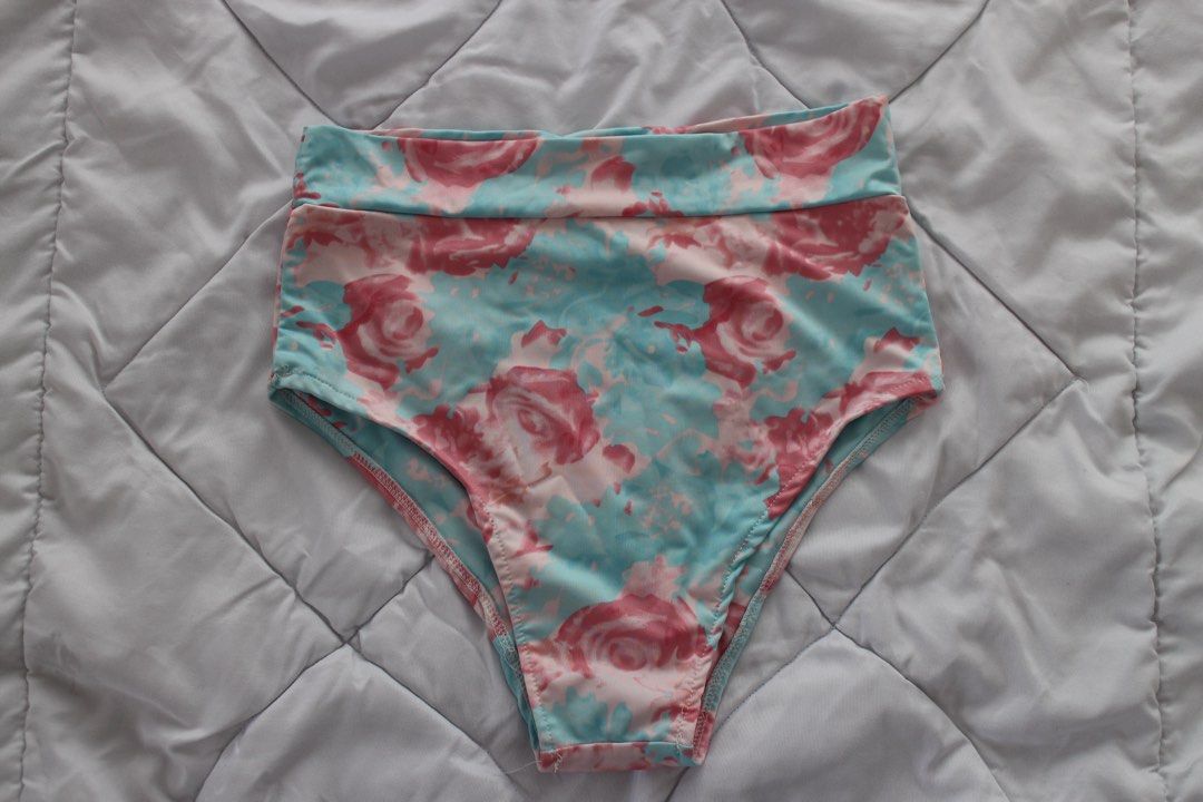 Floral High-Waisted Bikini Bottom (Category: Bikinis & Swimsuits) located in Makati City. Submitted by bysaaaam (Listing ID 1422474534, Image 1). Description: - High-waisted design - Floral pattern in pink and blue - Comfortable, folded waistband - Classic cut - Soft and stretchy fabric - Feminine and stylish.