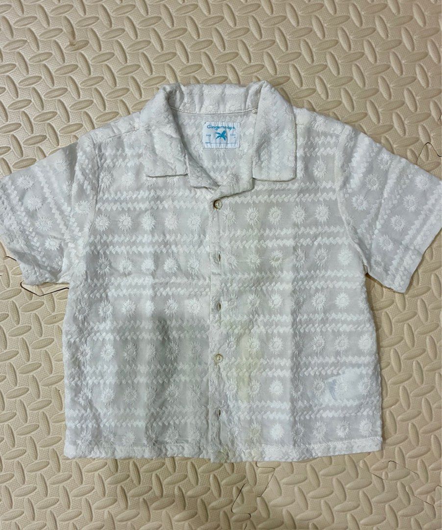 Gingersnaps Boy's Embroidered Shirt Size 4 (Category: Babies & Kids Fashion) located in Quezon City. Submitted by greatgoodies03 (Listing ID 1422505430, Image 1). Description: - Gingersnaps white short-sleeved shirt - Size 4 - Features an all-over embroidered floral pattern - Button-down front with collar - Noticeable stains on front.