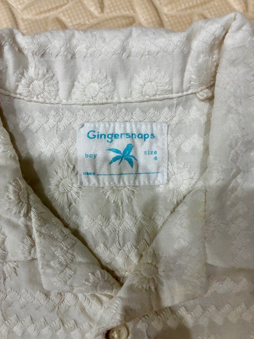 Gingersnaps Boy's Embroidered Shirt Size 4 (Category: Babies & Kids Fashion) located in Quezon City. Submitted by greatgoodies03 (Listing ID 1422505430, Image 3). Description: - Gingersnaps white short-sleeved shirt - Size 4 - Features an all-over embroidered floral pattern - Button-down front with collar - Noticeable stains on front.