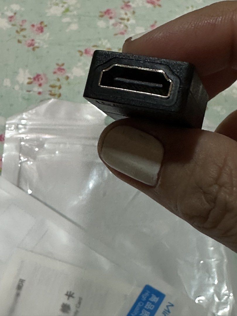 HDMI to HDMI Adapter (Category: Cables & Adaptors) located in Davao. Submitted by favoritepreloved (Listing ID 1422529545, Image 1). Description: - Brand new HDMI adapter - Mindpure brand - Comes in original packaging - Black color.