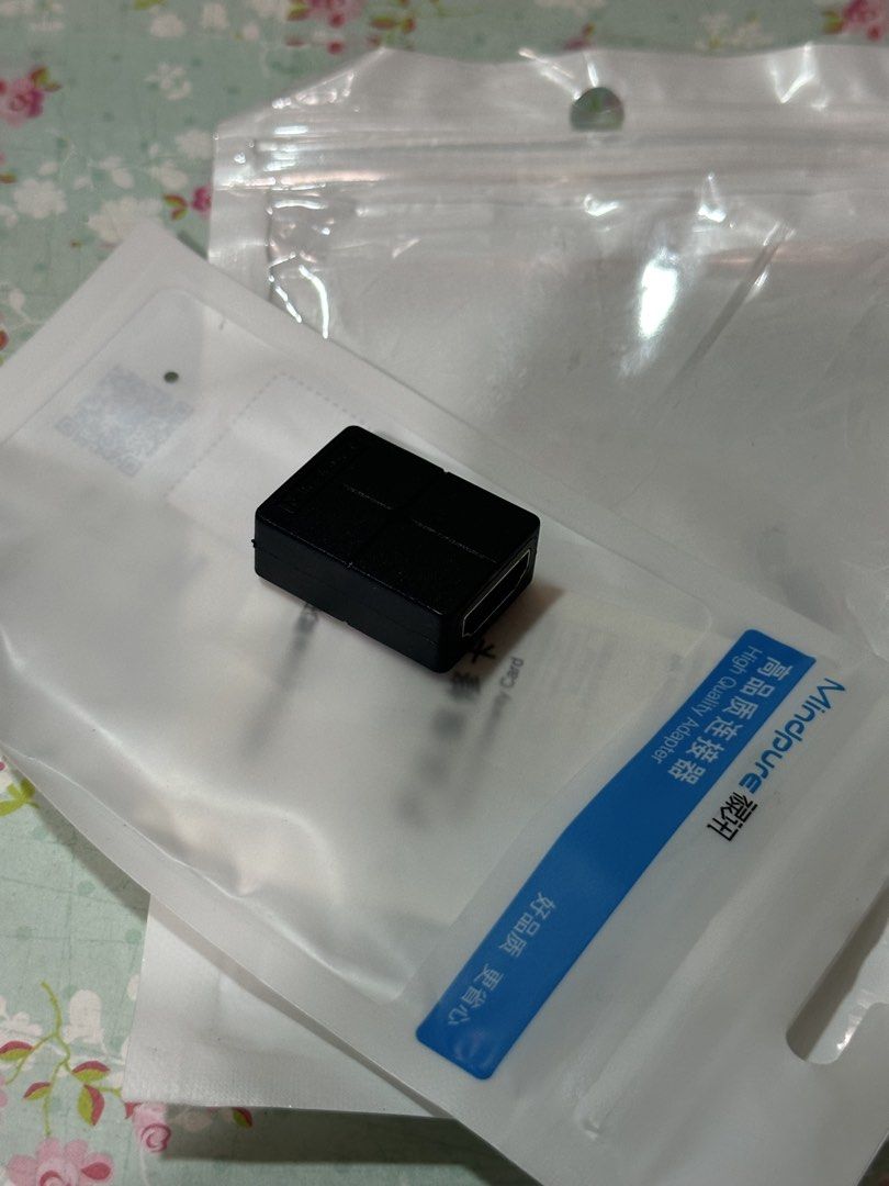 HDMI to HDMI Adapter (Category: Cables & Adaptors) located in Davao. Submitted by favoritepreloved (Listing ID 1422529545, Image 2). Description: - Brand new HDMI adapter - Mindpure brand - Comes in original packaging - Black color.