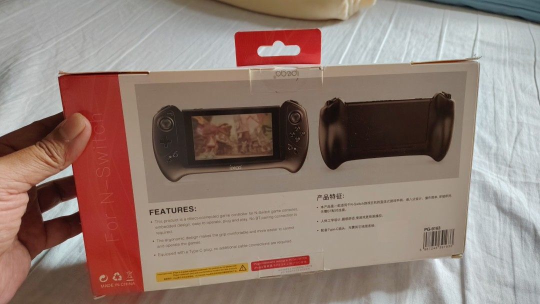 ipega Game Controller for N-Switch (Category: Controllers) located in Pasig City. Submitted by jumpedmarrow979 (Listing ID 1422419358, Image 2). Description: Brand new, old stock Decluttering Compatible with Switch v1 and v2 Loc: Pasig MoP: Maya, GCash, bank transfer - iPega game controller for N-Switch - Comfortable design for long gaming sessions - Features a built-in screen and buttons - Includes a holder for the N-Switch console - Box shows c