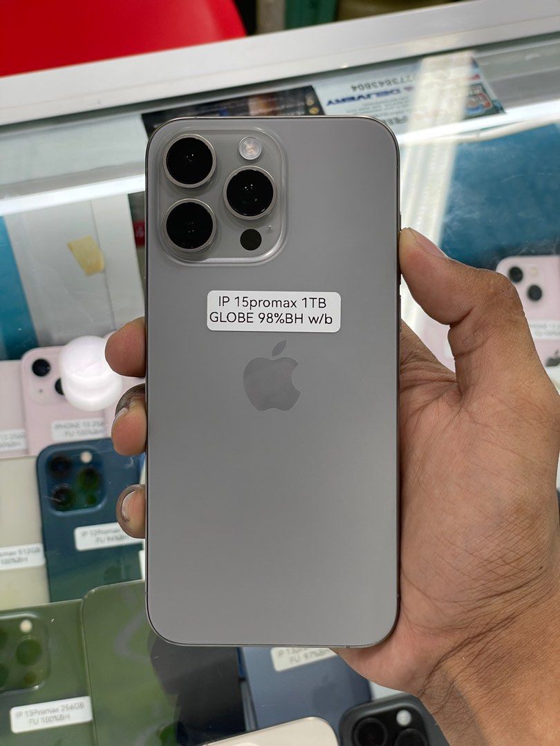iPhone 15 Pro Max 256GB 98%BH NTC Openline No Issue (Category: iPhone 15 Series) located in Manila. Submitted by benshop. (Listing ID 1422467369, Image 1). Description: FOR SALE | TRADE/SWAP BenShop Price : 49,000 php ▫️On hand: iPhone 15 Pro Max ▫️1TB ▫️Sim locked/Globe lock ▫️Natural Titanium ▫️98% Batt health ▫️Ntc Local Variant ▫️With Box original same serial and EMEI ▫️All Features Working INCLUSIONS & FREEBIES: *CHARGER SET *CLEAR CASE *TEM