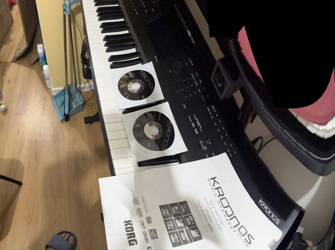 Korg Kronos 2 (Category: Musical Instruments) located in Bulacan. Submitted by noadtnse (Listing ID 1422408892, Image 2). Description: - Korg Kronos Music Workstation - Includes manuals and CDs - Full keyboard - Control knobs and display screen - Comes with a stand and foot pedal - Features various input/output ports - Black color Sobrang Kinis parang bago, d man lang nagamit sa Gig, sa bahay lang po. 73keys no issue..