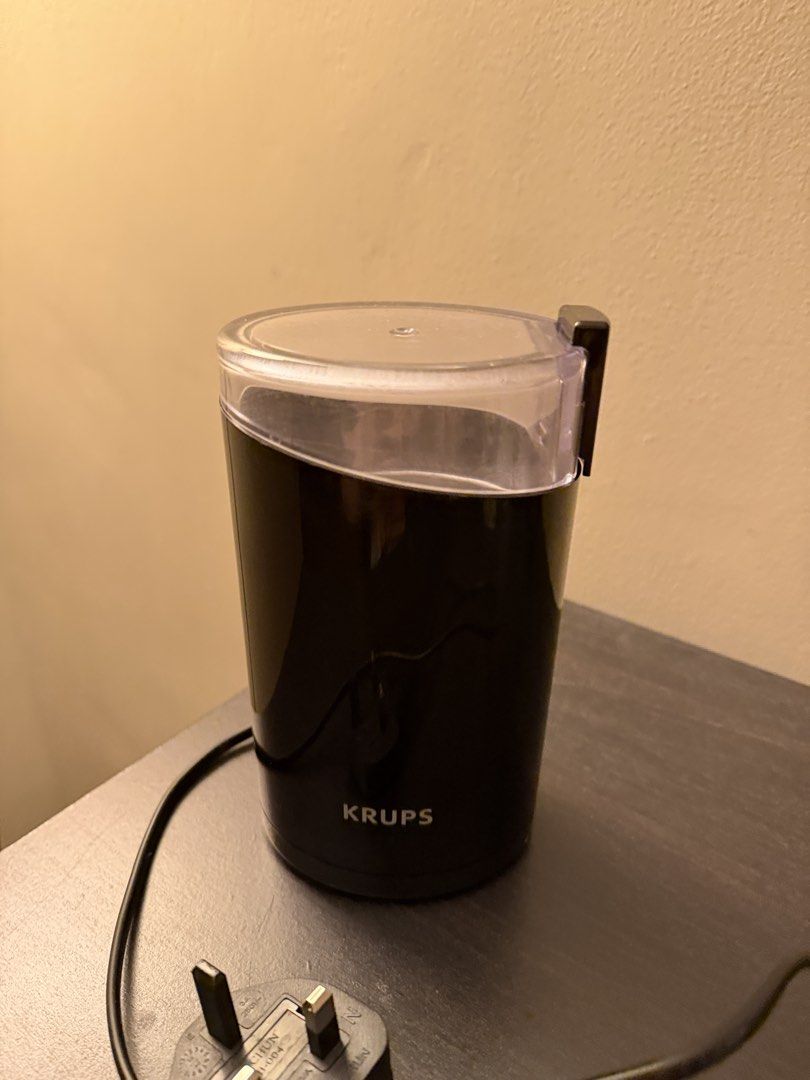 KRUPS Electric Coffee Grinder (Category: Coffee Machines & Makers) located in Paranaque City. Submitted by preloveditems111 (Listing ID 1422535660, Image 2). Description: - KRUPS electric coffee grinder - Clear lid for easy viewing - Blade grinder for efficient grinding - Black body - UK plug - Compact and easy to use - Great for grinding your own coffee beans.
