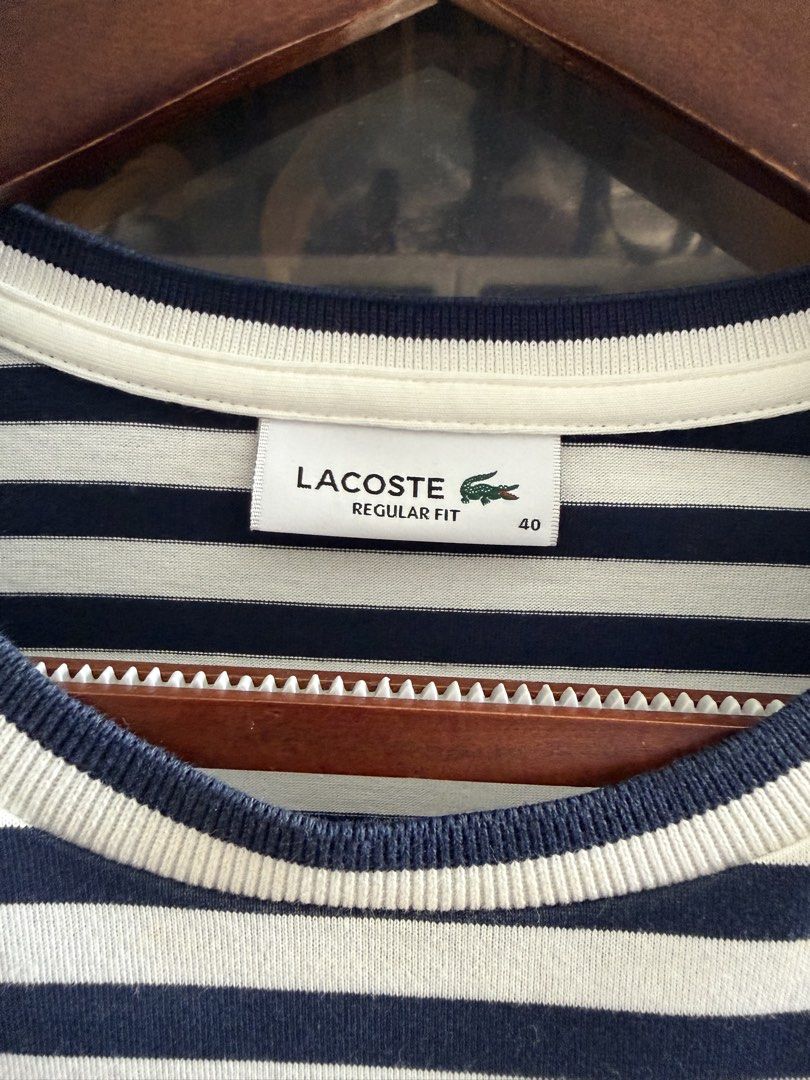 Lacoste Striped Long Sleeve Shirt (Category: Longsleeves) located in Lipa City. Submitted by jenragragio (Listing ID 1422446840, Image 3). Description: - Lacoste long sleeve shirt - Navy and white stripes - Size 40 - Features the iconic Lacoste crocodile logo - Regular fit - Crew neck - Ideal for casual wear.