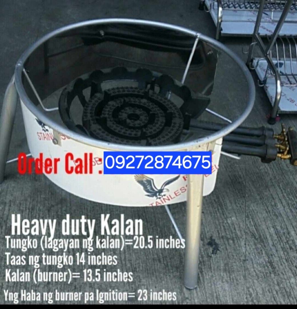 Large Wok with Burner and LPG Regulator (Category: Cookware & Accessories) located in Manila. Submitted by brightstar.b55721 (Listing ID 1422396721, Image 2). Description: - Large wok with burner and stand - Includes free LPG regulator and hose - Triple burner for efficient cooking - Features handles for easy transport - Ideal for outdoor cooking or commercial use - Perfect for cooking large quantities of food.