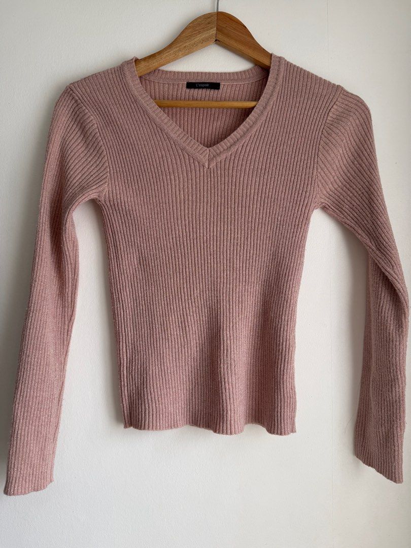 L'espoir Ribbed V-Neck Sweater (Category: Coats, Jackets and Outerwear) located in Caloocan City. Submitted by elle0001 (Listing ID 1422408068, Image 1). Description: - L'espoir V-neck sweater - Pink color - Ribbed design - Long sleeves - Fitted - Subtle shimmer - With minimal lints.