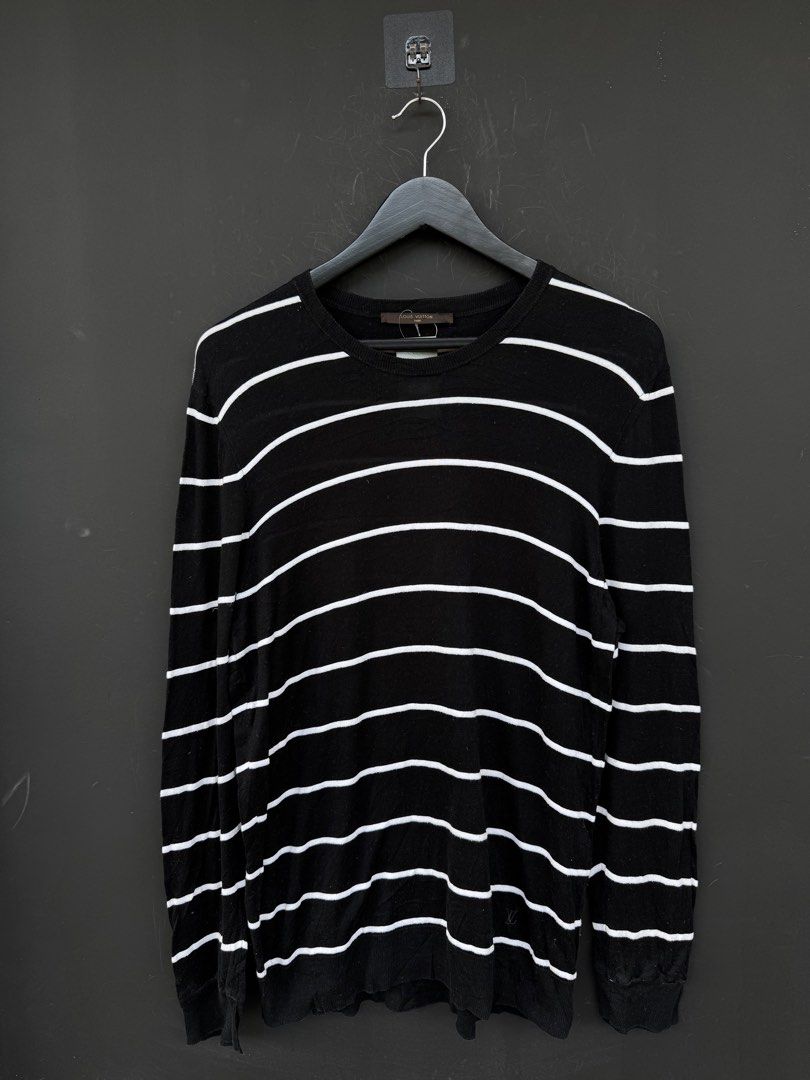 Louis Vuitton Striped Sweater (Category: Luxury Apparel) located in Caloocan City. Submitted by gooddayzzph (Listing ID 1422421926, Image 1). Description: - Louis Vuitton striped sweater - Size: M - Features a classic crew neck - Long sleeves for added warmth - Made in Italy - Subtle Louis Vuitton logo on the cuff.