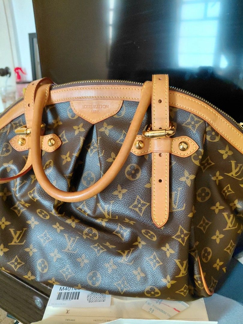 Louis Vuitton Tivoli (Category: Luxury Bags & Wallets) located in Pasig City. Submitted by redellie (Listing ID 1422430366, Image 3). Description: Monogram coated canvas. Material is paired with natural Vachetta cowhide leather trim and handles, featuring gold-tone brass hardware. inclusion: dustbag and original receipt.