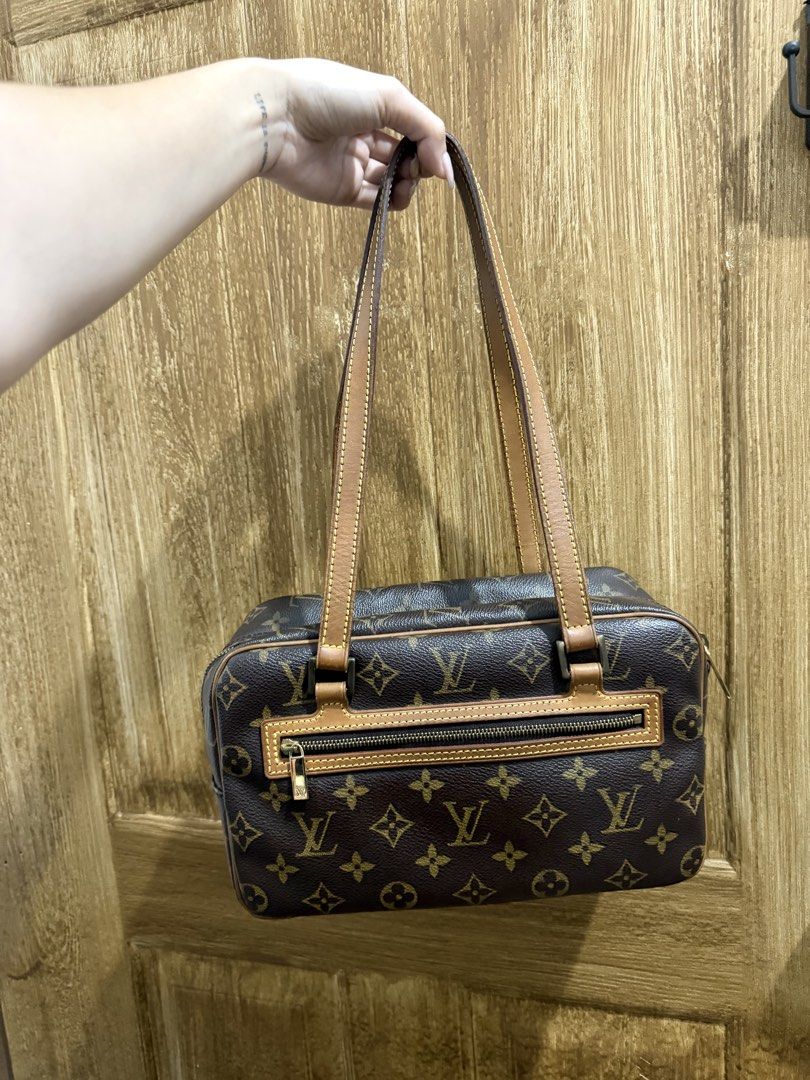 LV cite shoulder bag (Category: Luxury Bags & Wallets) located in Cainta. Submitted by bagsfromdara (Listing ID 1422534653, Image 1). Description: - Authentic Louis Vuitton shoulder bag - Monogram Canvas - Zip closure - Leather straps - Gold-tone hardware - Rectangular shape - Classic LV monogram pattern - Well-maintained.