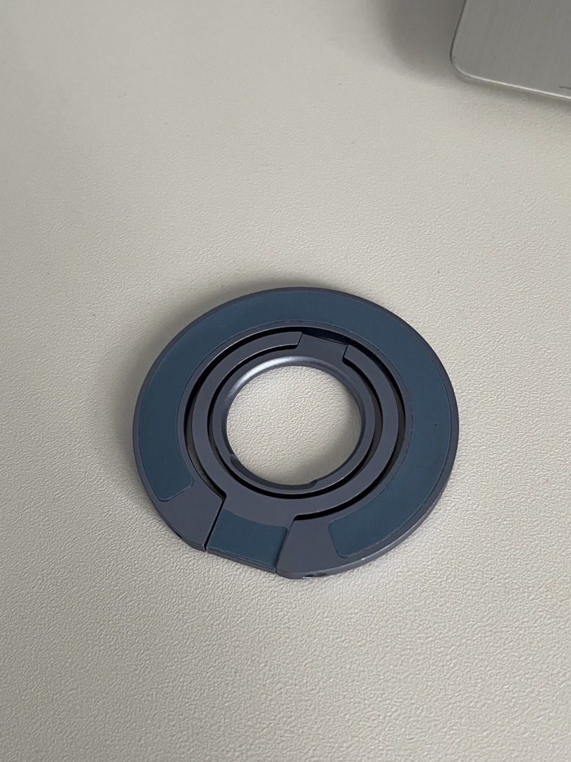 magnetic trifold ring phone stand kickstand (t. iphone android magsafe magnet popsocket) (Category: Other Gadgets) located in Las Pinas. Submitted by ofwingedmake (Listing ID 1422450225, Image 3). Description: - blue/purple/lavender color - trifold/adjustable/free rotation; can stand vertically or horizontally - strong, double-sided magnet (best if your phone case already has a magnet attached) - aluminum alloy frosted/matte finish before transac