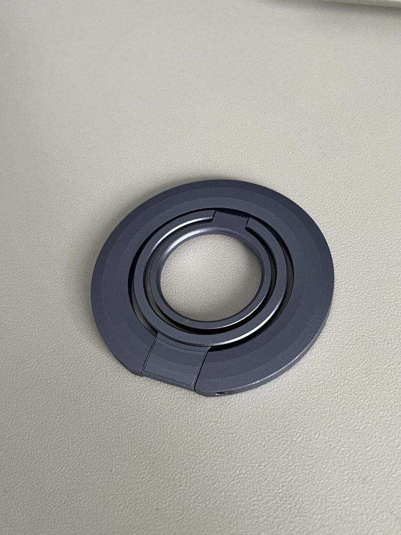 magnetic trifold ring phone stand kickstand (t. iphone android magsafe magnet popsocket) (Category: Other Gadgets) located in Las Pinas. Submitted by ofwingedmake (Listing ID 1422450225, Image 2). Description: - blue/purple/lavender color - trifold/adjustable/free rotation; can stand vertically or horizontally - strong, double-sided magnet (best if your phone case already has a magnet attached) - aluminum alloy frosted/matte finish before transac