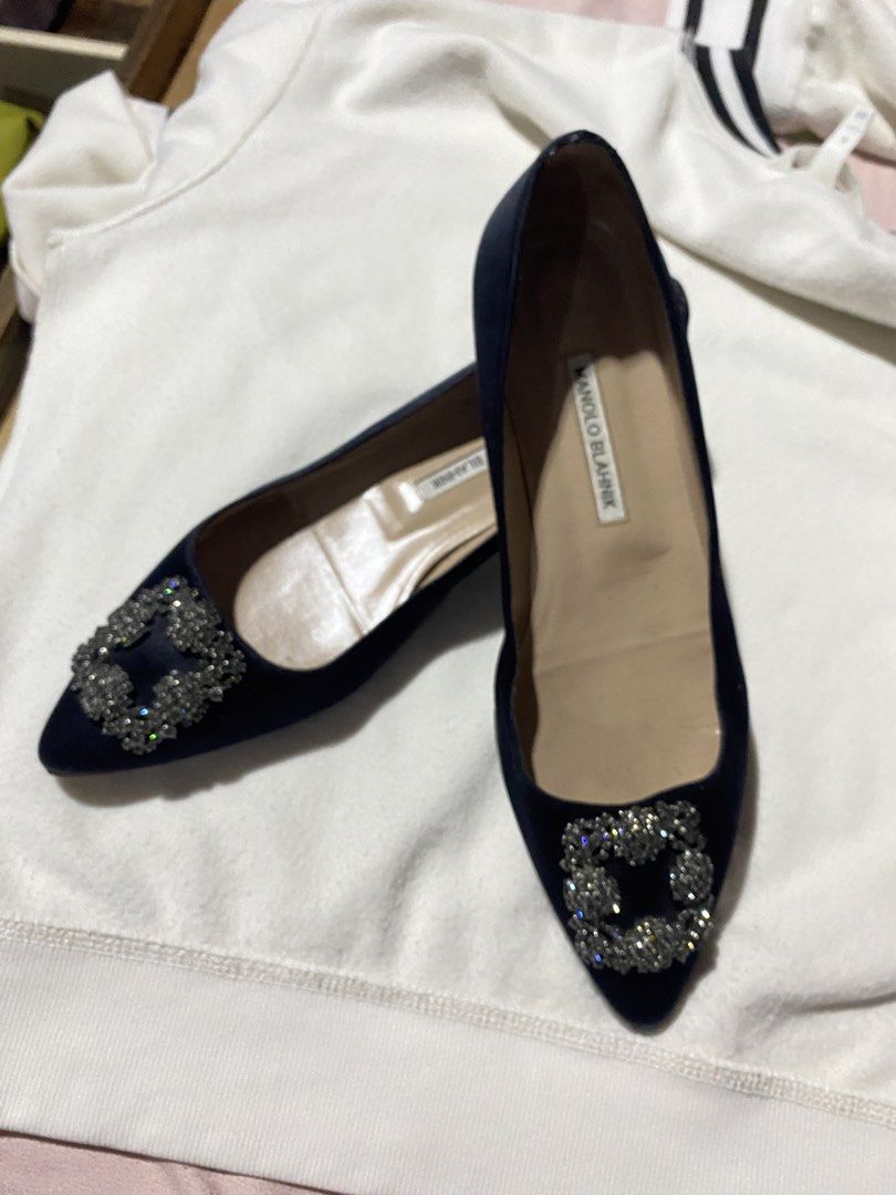 Manolo Blahnik Hangisi Satin Flats (Category: Flats & Sandals) located in Manila. Submitted by pecsonmalouv.40 (Listing ID 1422482438, Image 2). Description: - Manolo Blahnik Hangisi flats - Black satin - Sparkling crystal buckle - Pointed toe - Sophisticated design - Perfect for special occasions - Manolo Blahnik logo visible.
