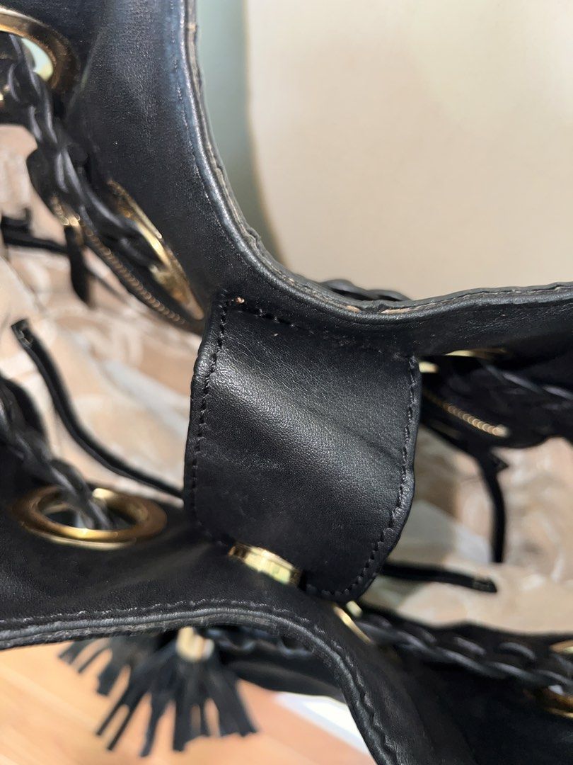 Michael Kors Black Leather Hobo Bag (Category: Luxury Bags & Wallets) located in Manila. Submitted by bby.yng (Listing ID 1422463292, Image 3). Description: - Michael Kors black leather hobo bag - Braided shoulder straps - Gold-tone hardware - Tassel detail - MK logo charm - Interior zip pocket - Monogram lining - Spacious interior - with free dust bag.