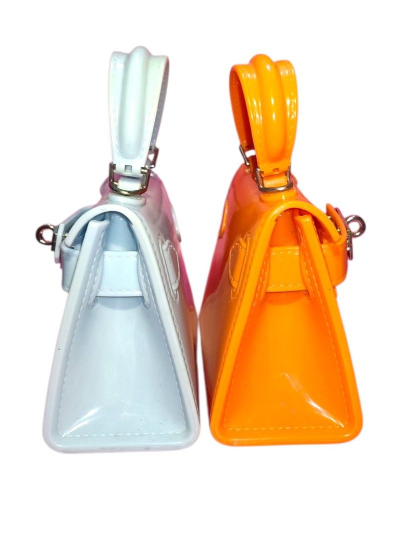 Miniature Patent Handbag - Pastel Blue & Orange (Category: Tote Bags) located in Muntinlupa City. Submitted by chi_zz (Listing ID 1422543500, Image 3). Description: -mini Birkin Inspired Jelly Bag - Miniature handbags in pastel blue and vibrant orange - Glossy patent finish - Top handle - Secure clasp closure - Structured, rectangular shape - Silver-tone hardware - Perfect for adding a pop of color.