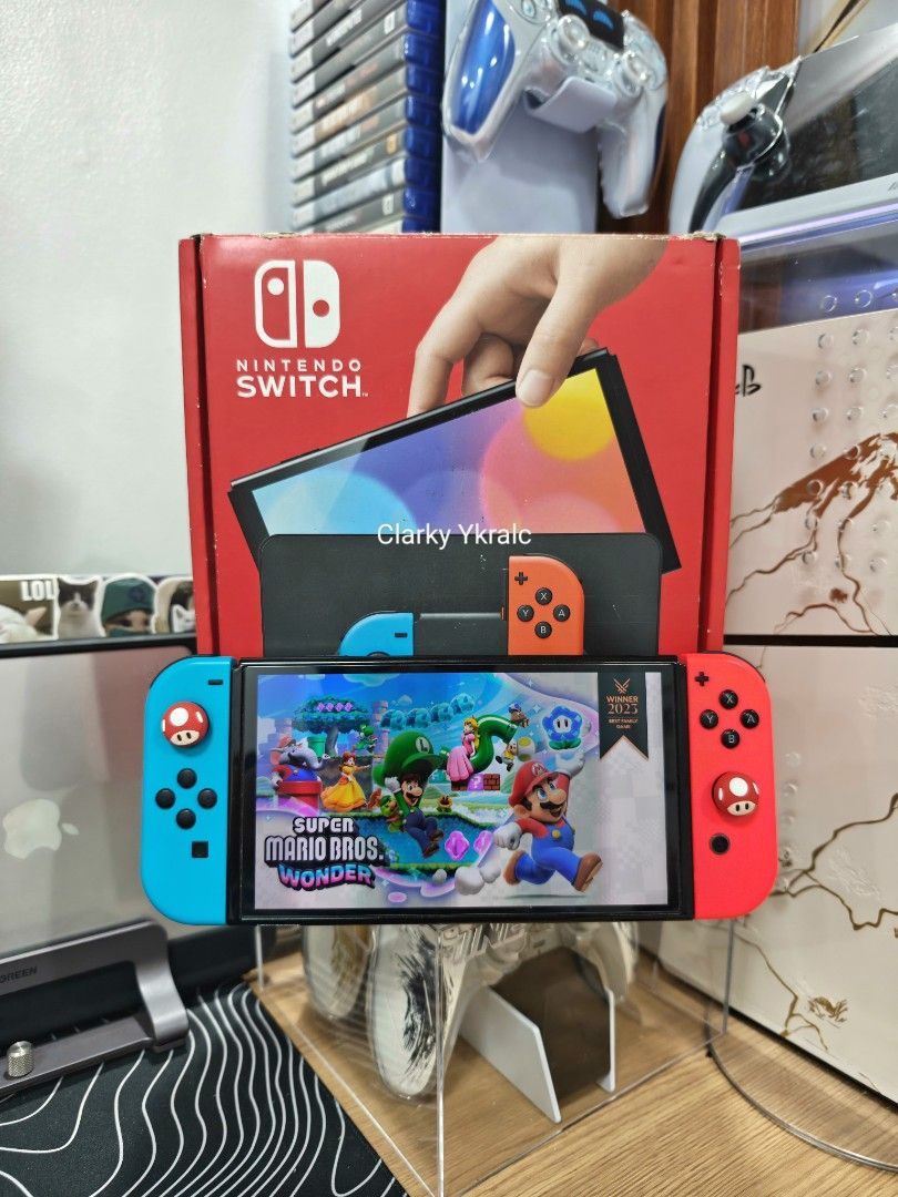 Nintendo Switch OLED with Free Games (Category: Nintendo) located in Manila. Submitted by nswitchgear (Listing ID 1422461378, Image 2). Description: Nintendo Switch OLEDs with Free Games ₱10,499 FREE acess to my Paid games Legit purchase not Jailbreak. Used item but in Good/Best condition Can give 7 Days personal Warranty for peace of mind. -Doon po tayo sa kaya tayong issupport, dont settle for less. Comes w/ Box ,pouch, straps only. Any of my D