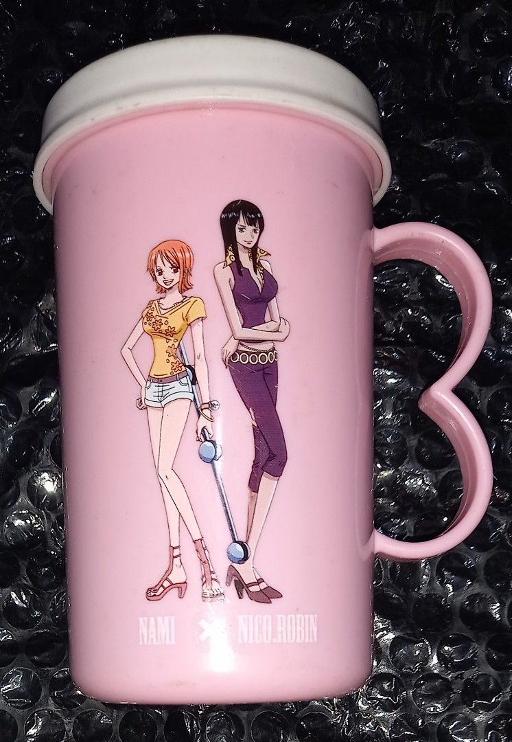 ONE PIECE x KFC NAMI & NICO ROBIN MUG (Category: Coffee & Tea Tableware) located in Cagayan de Oro. Submitted by edwardryan01984 (Listing ID 1422395824, Image 2). Description: ONE PIECE x KFC PLASTIC MUG NAMI & NICO ROBIN.