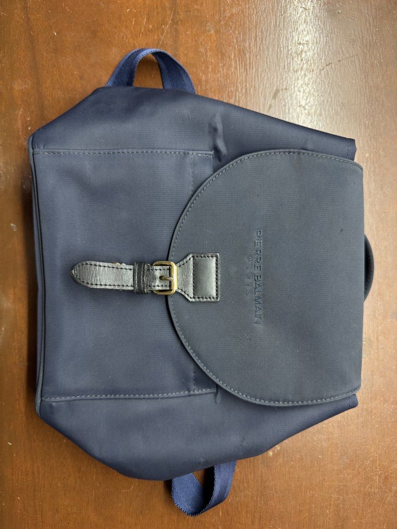 Pierre Balmain Backpack (Category: Backpacks) located in Tigbauan. Submitted by declaitter (Listing ID 1422480298, Image 1). Description: Pierre Balmain Backpack Navy Blue Color Can fit iPad Air 11” Bought from Sonu Vintage for ₱2000 something Buyer will shoulder the delivery fee Can send more photos and videos if requested Location: Iloilo RFS: I don’t use it anymore. MOP: GoTyme/GCash/BDO MOD: LBC .