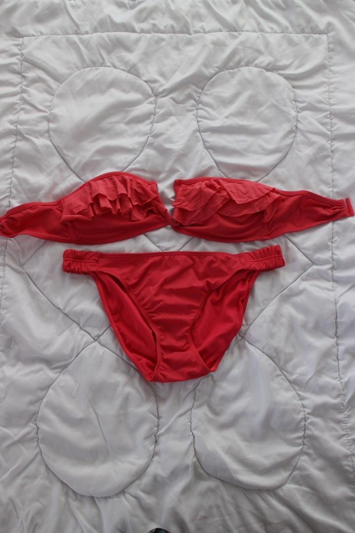 Red Ruffle Bikini Set (Category: Bikinis & Swimsuits) located in Makati City. Submitted by bysaaaam (Listing ID 1422434284, Image 1). Description: - Red bikini set - Bandeau top with ruffle detailing - Classic cut bottoms - Made of smooth, stretchy material - Complete set.