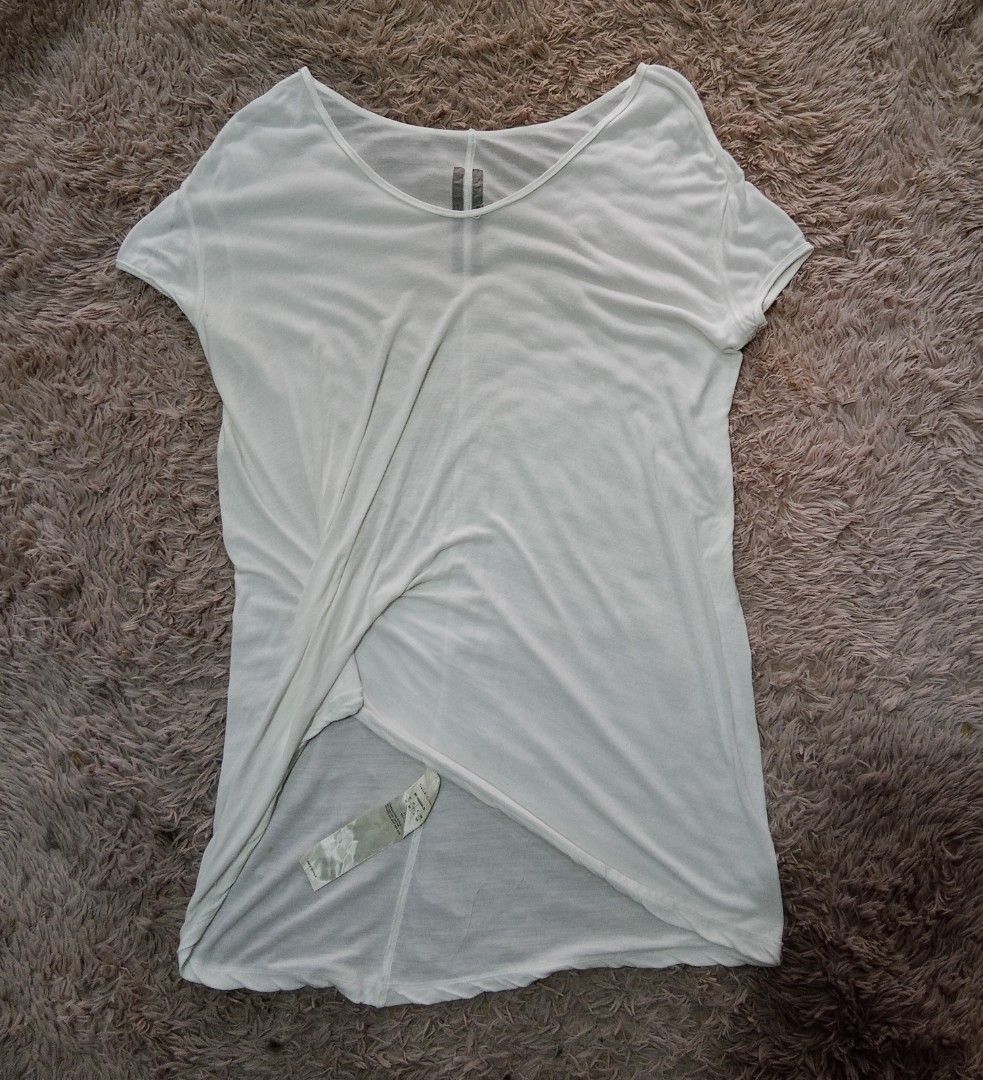 Rick Owens Top (Category: Luxury Apparel) located in Lucban. Submitted by aeronroyyy (Listing ID 1422404486, Image 1). Description: - Rick Owens white top - Unique draped design - Made in Italy - Size: 36 (IT), 8 (GB), 4 (US) - Fabric: 81% viscose, 19% silk - Care: Hand wash cold, no bleach, no iron, no dry clean.